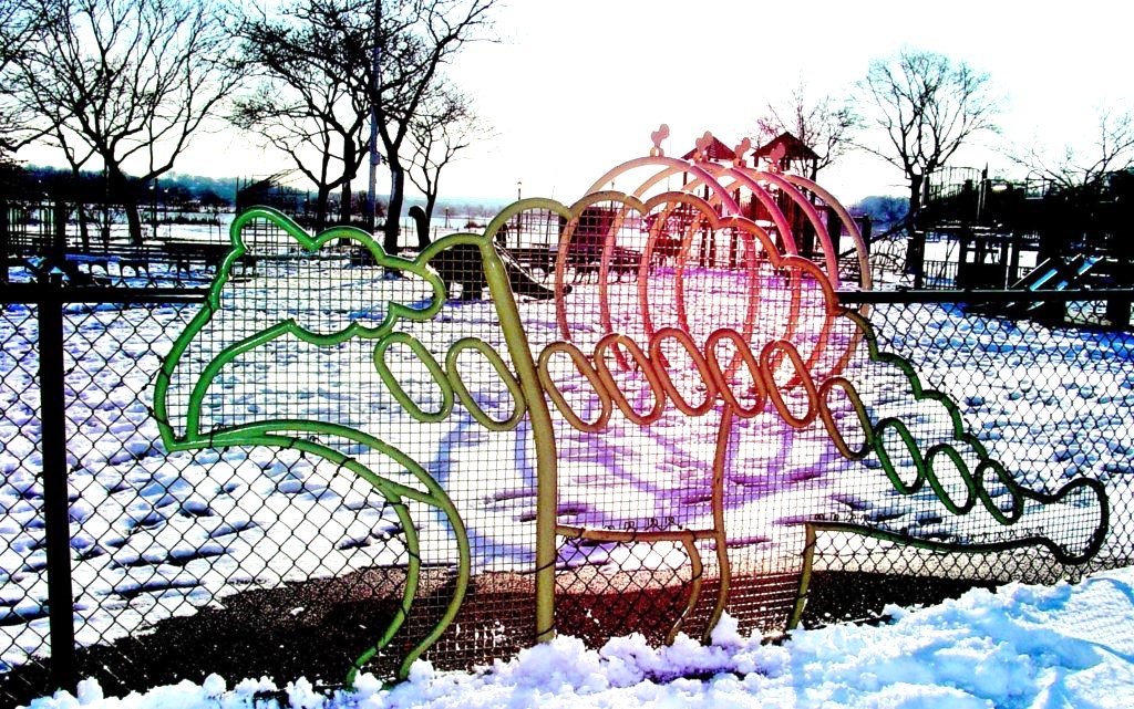 Dinosaur fence panel in bent tube shading from green through orange to pink
