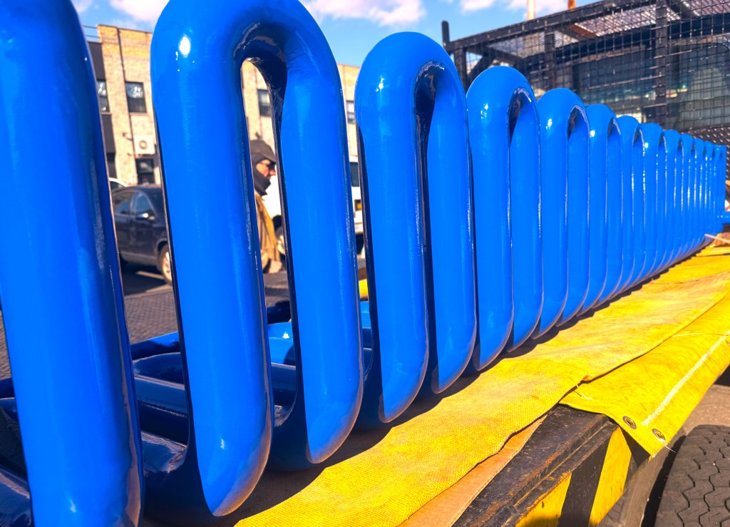 Rolled and bent tube, finished in blue