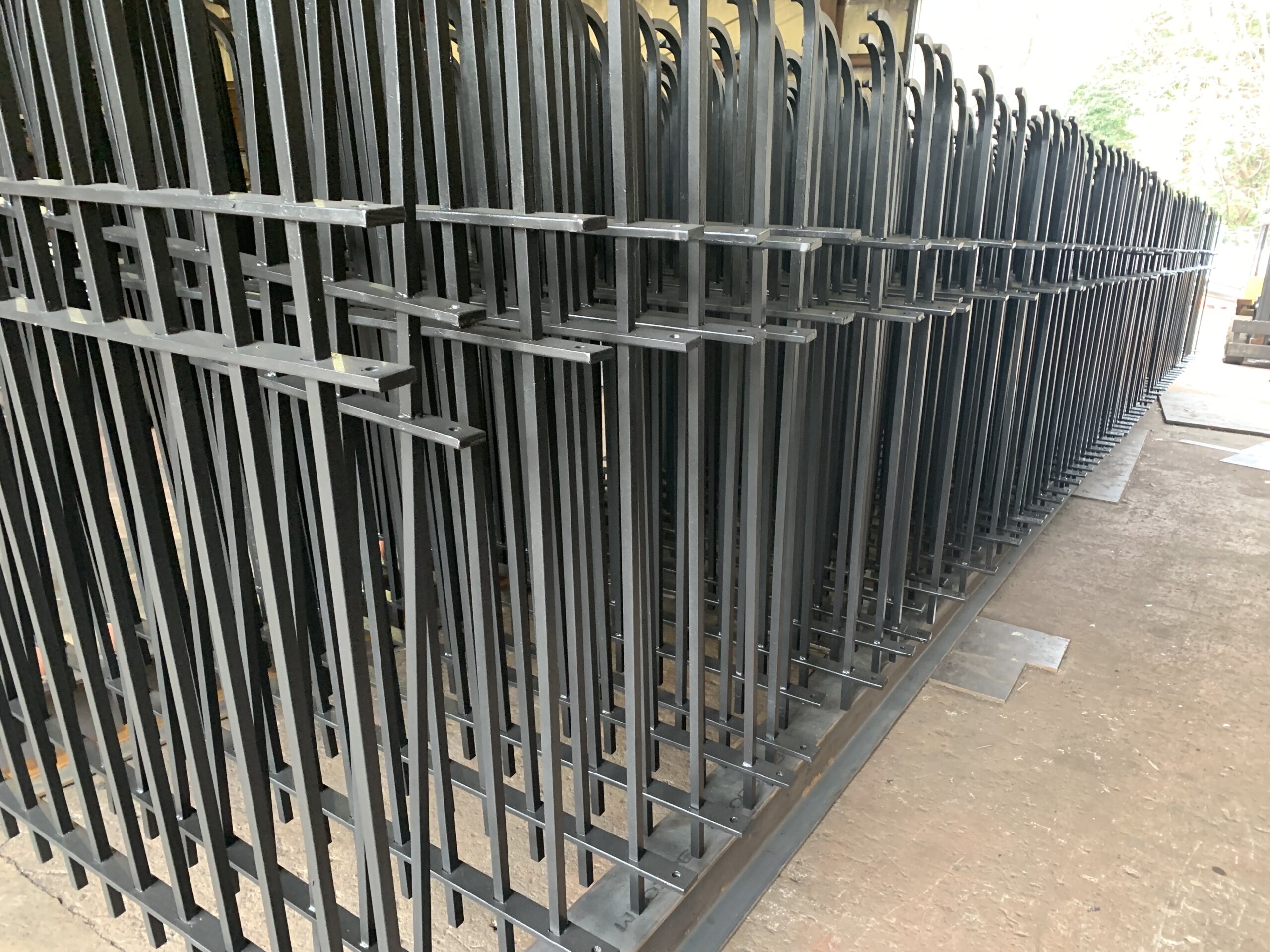 Finished wrought iron fence sections in the fabrication yard